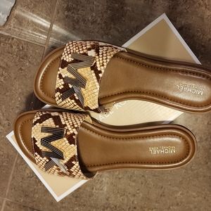 Michael kors MK embossed leather slides.